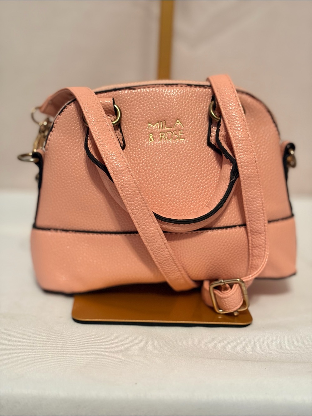 Pink Mila & Rose crossbody purse made from "vegan" leather. 